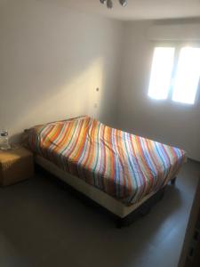 Posteľ alebo postele v izbe v ubytovaní LA VILLA NESSIRAH
