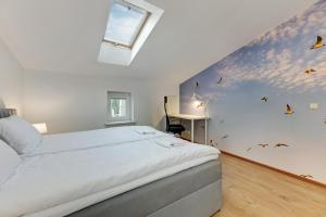 Posteľ alebo postele v izbe v ubytovaní Apartament George