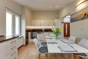 Kuchyňa alebo kuchynka v ubytovaní Apartament George