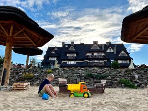 Dzieci zatrzymujące się w obiekcie Hotel Burkaty