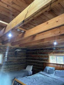 Postel nebo postele na pokoji v ubytování Rustic Ridge + 16 fotografií