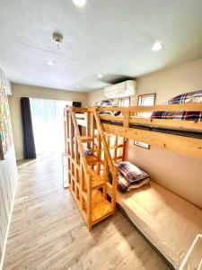a bunk bed room with two bunk beds at RSDvillage in Miura