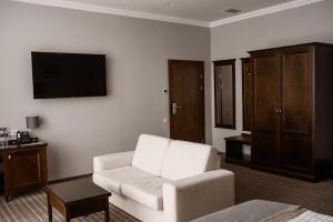 TV a/nebo společenská místnost v ubytování Optima Collection Park Hotel Ivano-Frankivsk