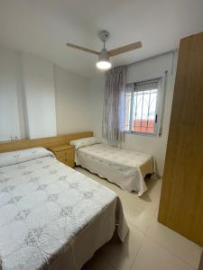 A bed or beds in a room at Alpen1 Europeñiscola