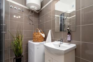 Kúpeľňa v ubytovaní WOW Apartment by Cozyplace