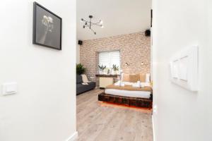 Posteľ alebo postele v izbe v ubytovaní WOW Apartment by Cozyplace