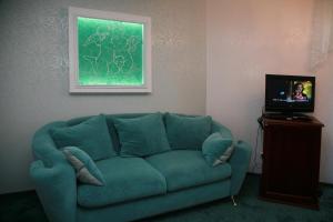 TV a/nebo společenská místnost v ubytování Optima Collection Park Hotel Ivano-Frankivsk