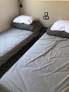 Posteľ alebo postele v izbe v ubytovaní Camping le Castellas