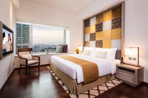Voodi või voodid majutusasutuse Ascott Macau toas