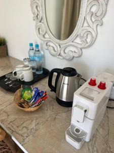 Příslušenství pro přípravu čaje a kávy v ubytování The Runway Lodge + 16 fotografií