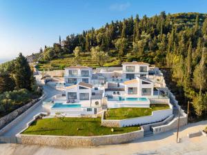 an aerial view of a large house on a hill at Dama Olga Villas in Lygia