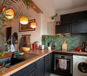 Kuchyňa alebo kuchynka v ubytovaní Appartement T3 70m2 lumineux proche de la gare + 8 fotografií
