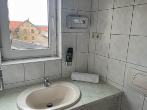 Koupelna v ubytování Harzhotel Warnstedter Krug