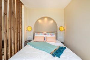 Posteľ alebo postele v izbe v ubytovaní Euphoria Suites