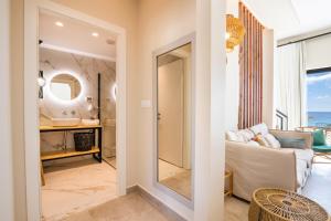 Posteľ alebo postele v izbe v ubytovaní Euphoria Suites