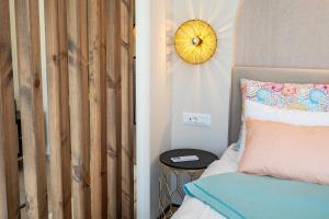 Posteľ alebo postele v izbe v ubytovaní Euphoria Suites