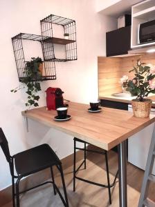 Kuchyňa alebo kuchynka v ubytovaní Studio atypique centre Rouen