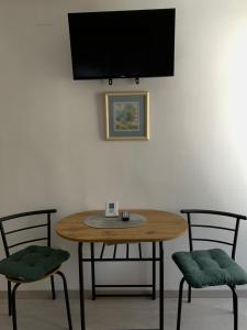 Televízia a/alebo spoločenská miestnosť v ubytovaní Bed&Breakfast Đurđan