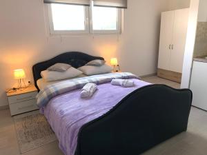 Posteľ alebo postele v izbe v ubytovaní Bed&Breakfast Đurđan