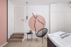 a room with a pink apple on the wall at Apartment Pearl, Opatija center in Opatija