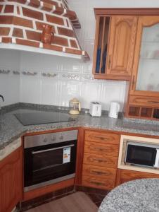 Köök või kööginurk majutusasutuses Mi Piriposa
