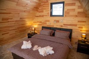 Un pat sau paturi într-o cameră la Cez A-Frame