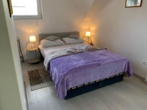 Posteľ alebo postele v izbe v ubytovaní Bed&Breakfast Đurđan