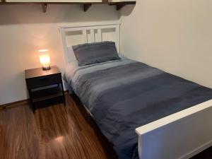 מיטה או מיטות בחדר ב-Beautiful Parkview Luxury Four 4 Bedrooms House