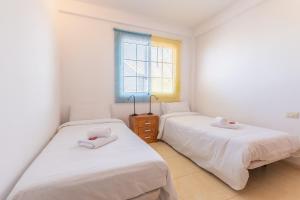 Posteľ alebo postele v izbe v ubytovaní 2BR Home with Parking - Mountain Views Terrace