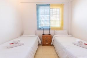 Posteľ alebo postele v izbe v ubytovaní 2BR Home with Parking - Mountain Views Terrace