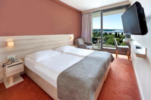 Postelja oz. postelje v sobi nastanitve Hotel Materada Plava Laguna