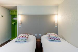 Postel nebo postele na pokoji v ubytování Campanile Rouen Sud - Zénith - Parc Expo