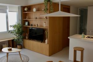 TV a/nebo společenská místnost v ubytování WISH SUITE SAN BARTOLOME DE SEVILLA