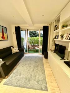 Posedenie v ubytovaní Deauville, maison au coeur de la ville