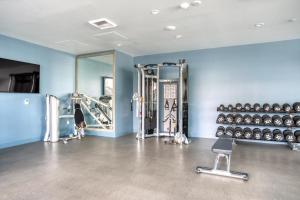 a room with a gym with a lot of equipment at Downtown 1BR w Pool Jacuzzi Gym nr 110 LAX-836 in Los Angeles
