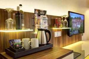 Kaffee-/Teezubehör in der Unterkunft Hotel Am Badepark