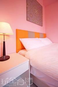 Ein Bett oder Betten in einem Zimmer der Unterkunft Kinmen Line In Bed and Breakfast