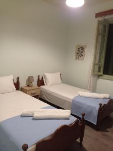 Кровать или кровати в номере Villa Lidi