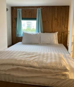 Postel nebo postele na pokoji v ubytování B475house