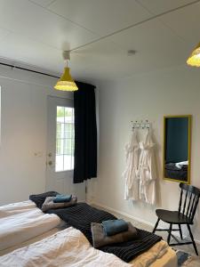 Cama o camas de una habitación en Bjarkarlækur - Meet the Locals