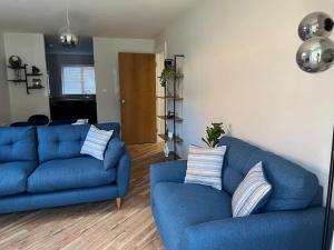 Гостиная зона в Apartment in Birkdale - 2 bedrooms