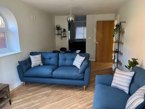 Гостиная зона в Apartment in Birkdale - 2 bedrooms
