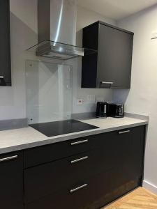 Кухня или мини-кухня в Apartment in Birkdale - 2 bedrooms
