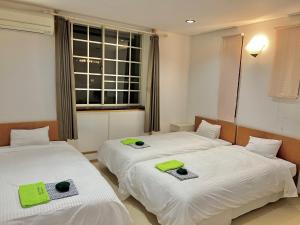 Letto o letti in una camera di JAS HOTEL TAKAYAMA