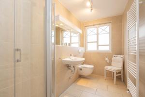 Ένα μπάνιο στο Uhlenkamp Appartement -1- im UHLENKAMP
