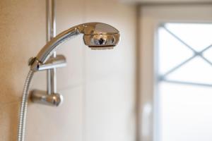 Koupelna v ubytování Uhlenkamp Appartement -7- im UHLENKAMP + 3 fotografie