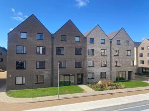 an image of a building with pointed roofs at For Students Only Ensuite Bedrooms at Westwood Student Mews in Warwick in Coventry