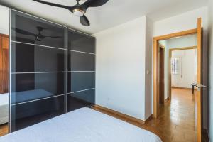 Łóżko lub łóżka w pokoju w obiekcie Dúplex junto a la playa