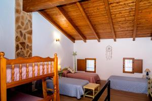 Posteľ alebo postele v izbe v ubytovaní Casa rural la balsa