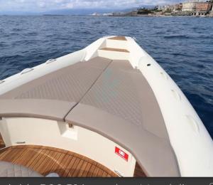 a front end of a boat in the water at CASA IB in Peri